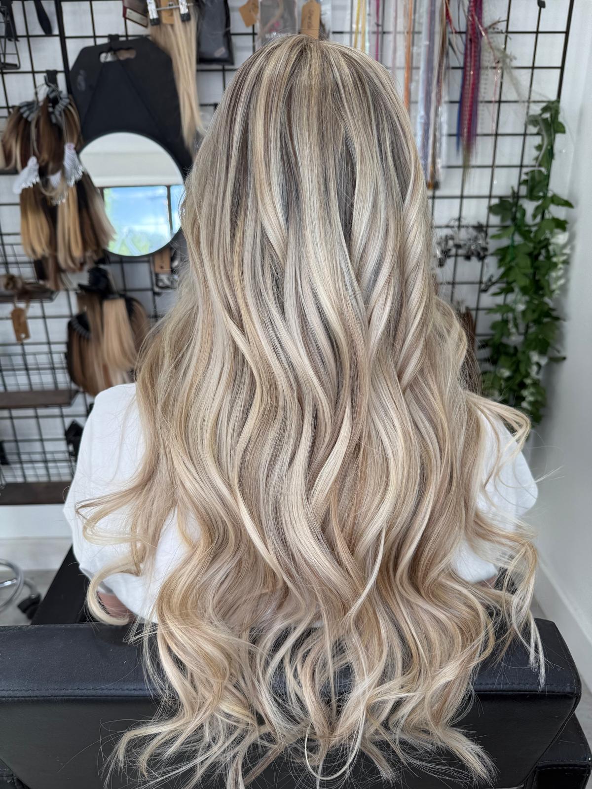 After photo of dimensional blonde waves by Rebecca Jane Hair