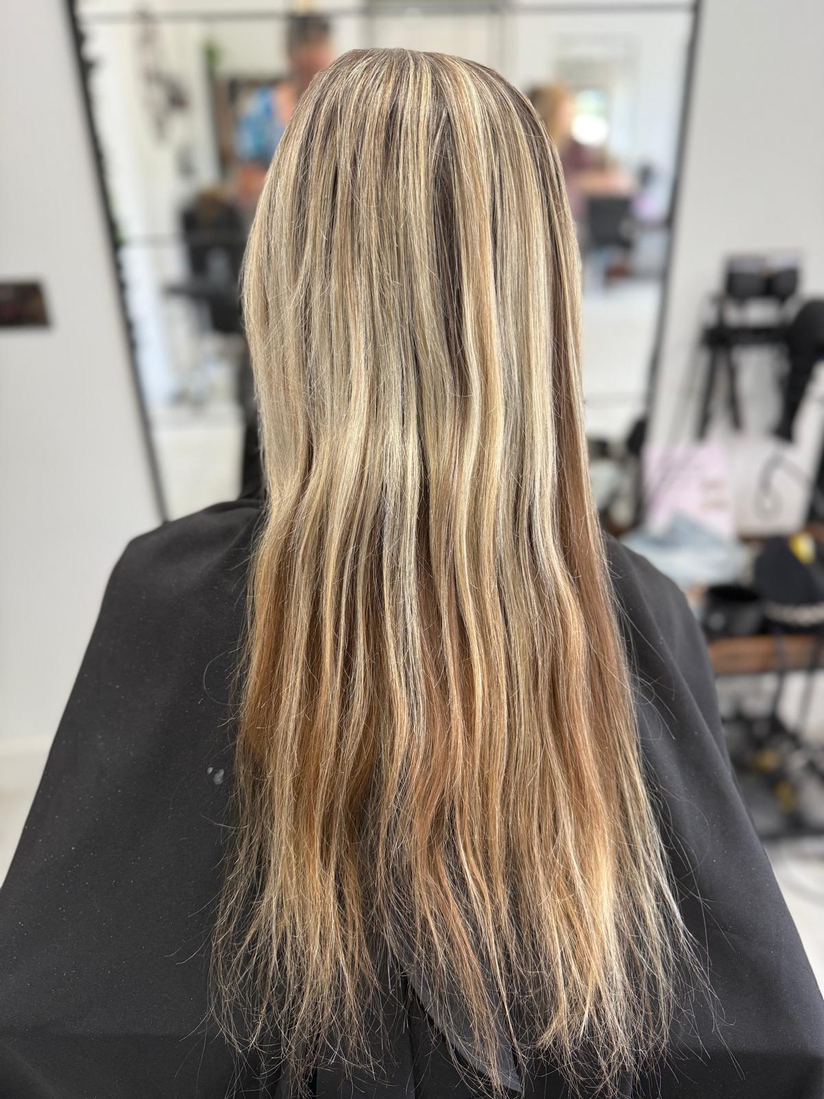 Before photo of highlighted blonde hair before a Rebecca Jane Hair appointment