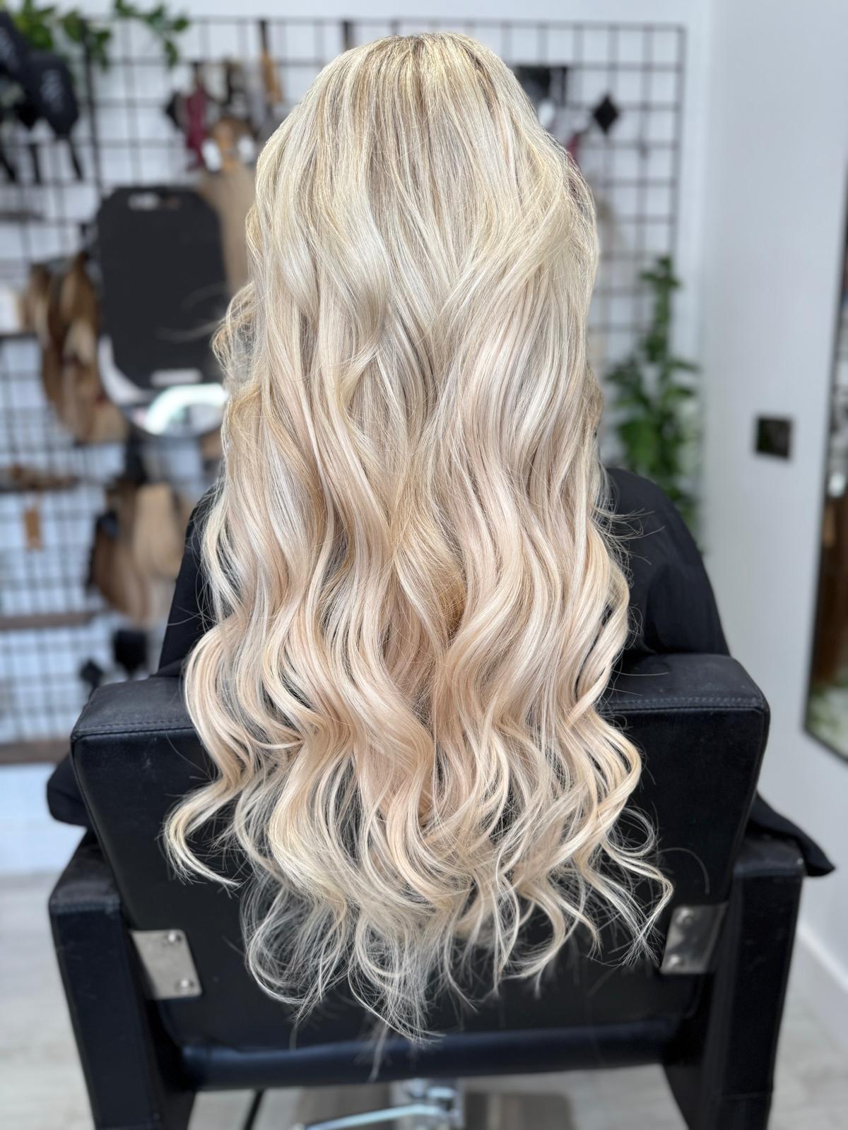 After photo of silver blonde waves by Rebecca Jane Hair