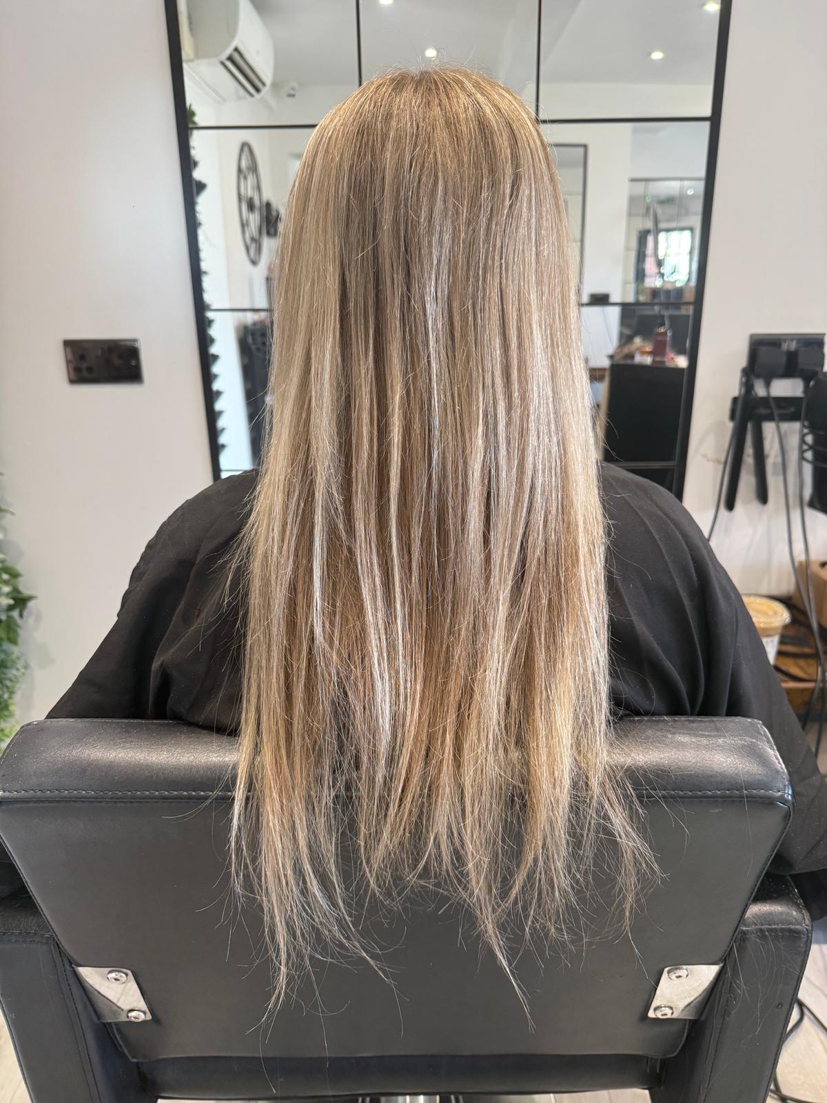 Before photo of long blonde hair before a Rebecca Jane Hair appointment