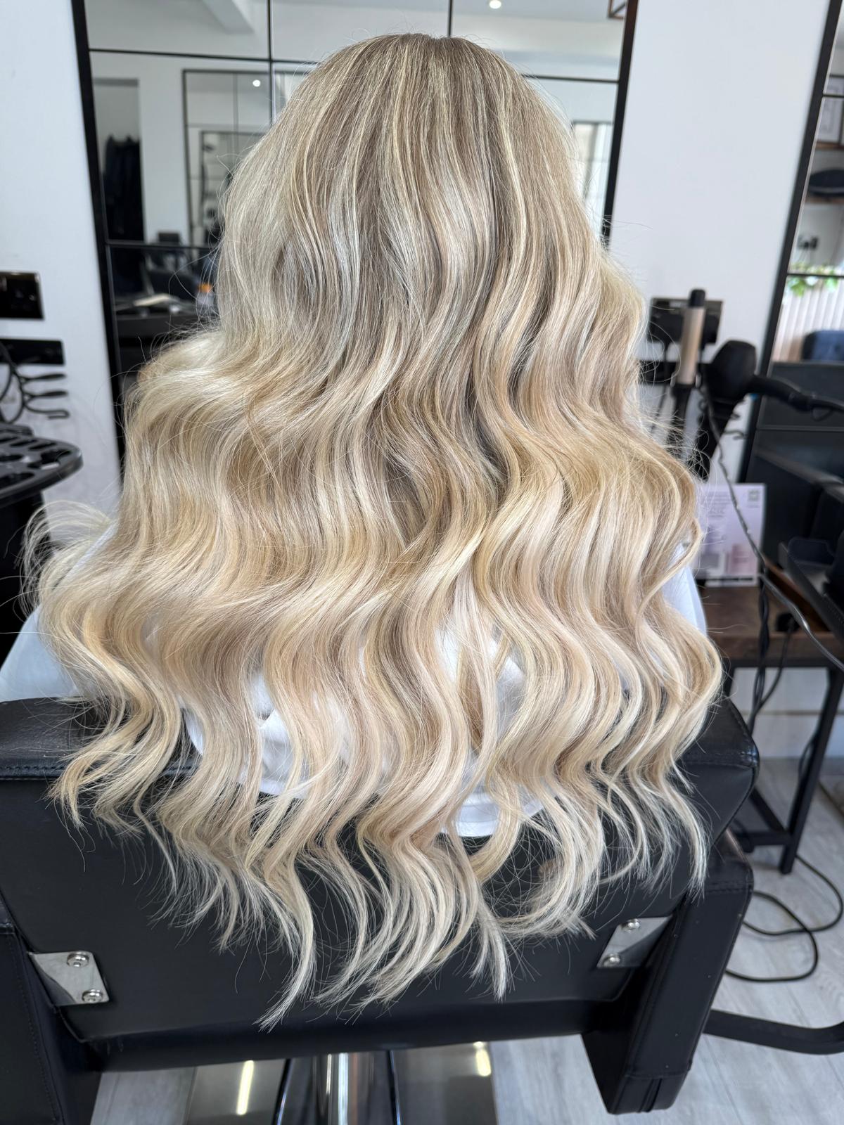 After photo of bright blended blonde waves by Rebecca Jane Hair