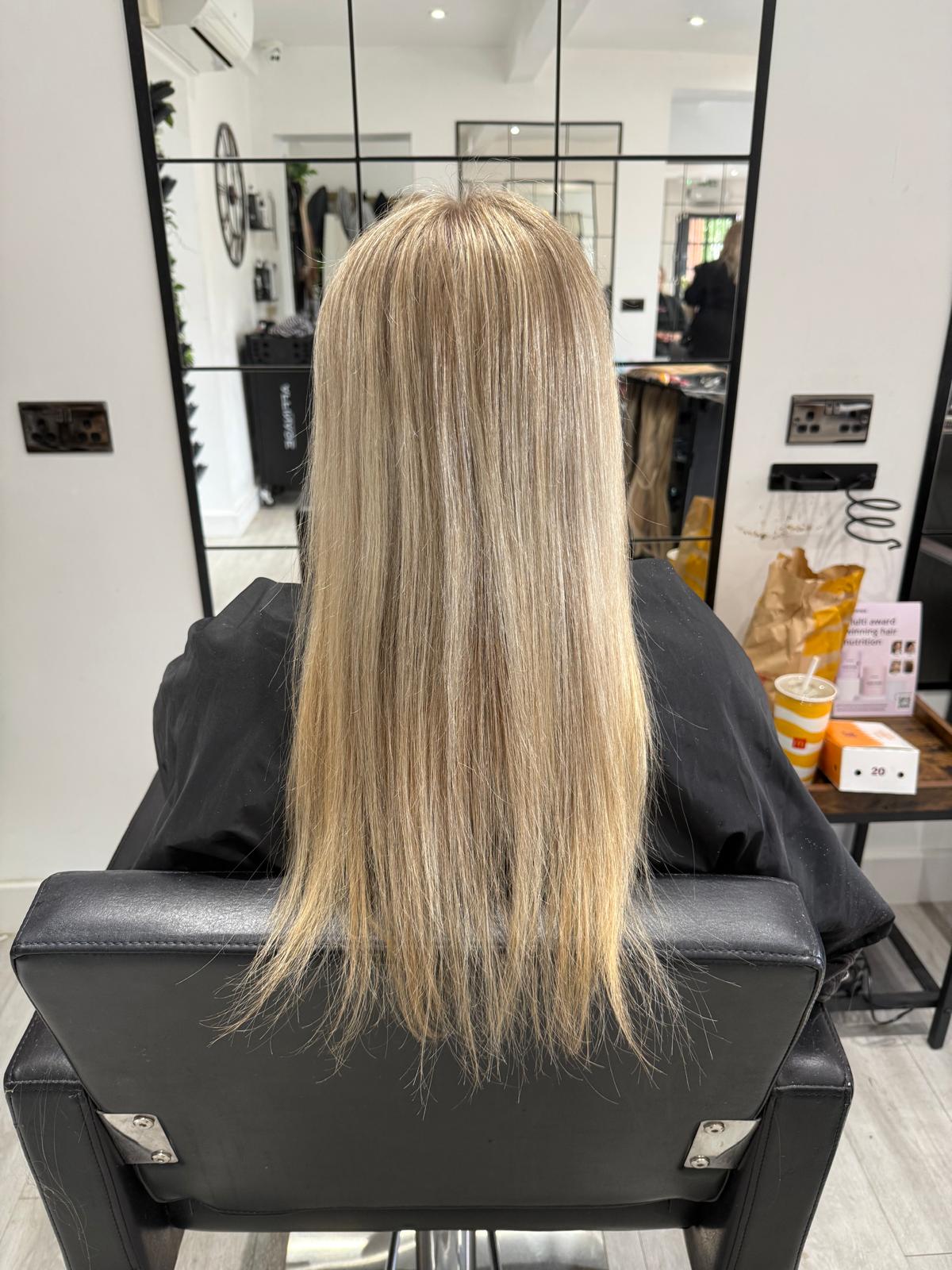 Before photo of long blonde hair before a Rebecca Jane Hair appointment