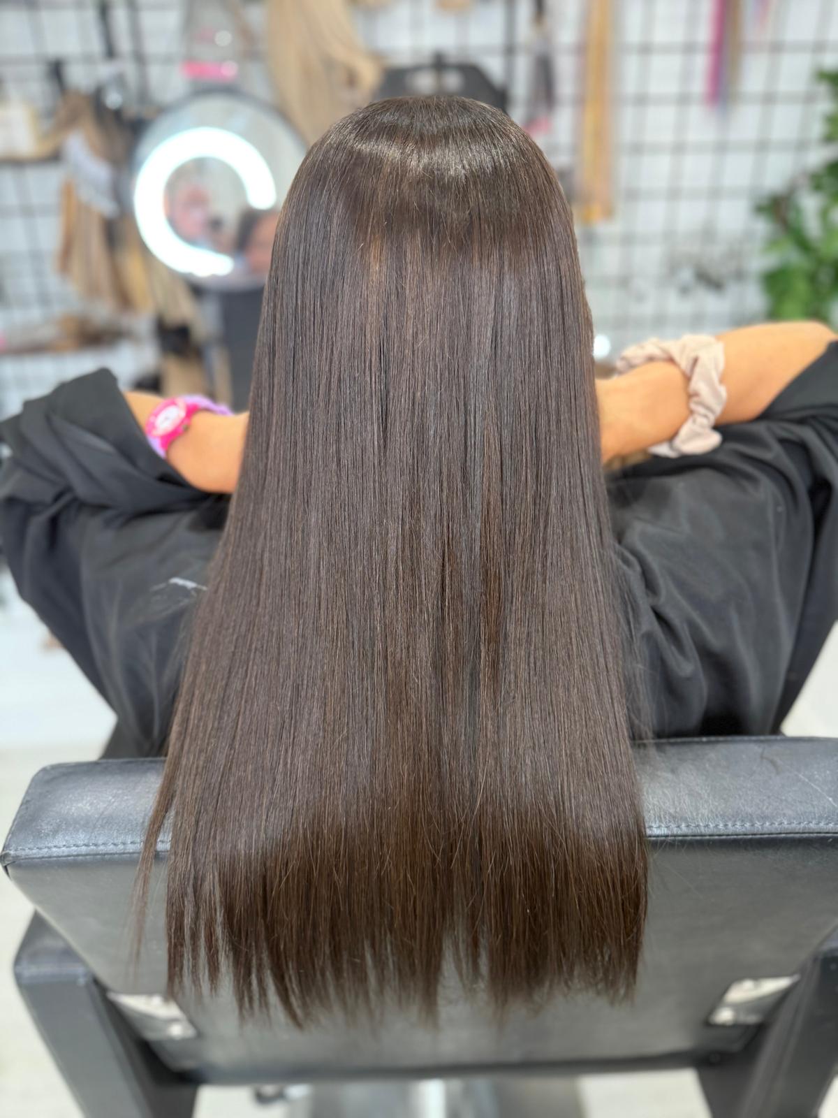 After photo of smooth brunette hair by Rebecca Jane Hair