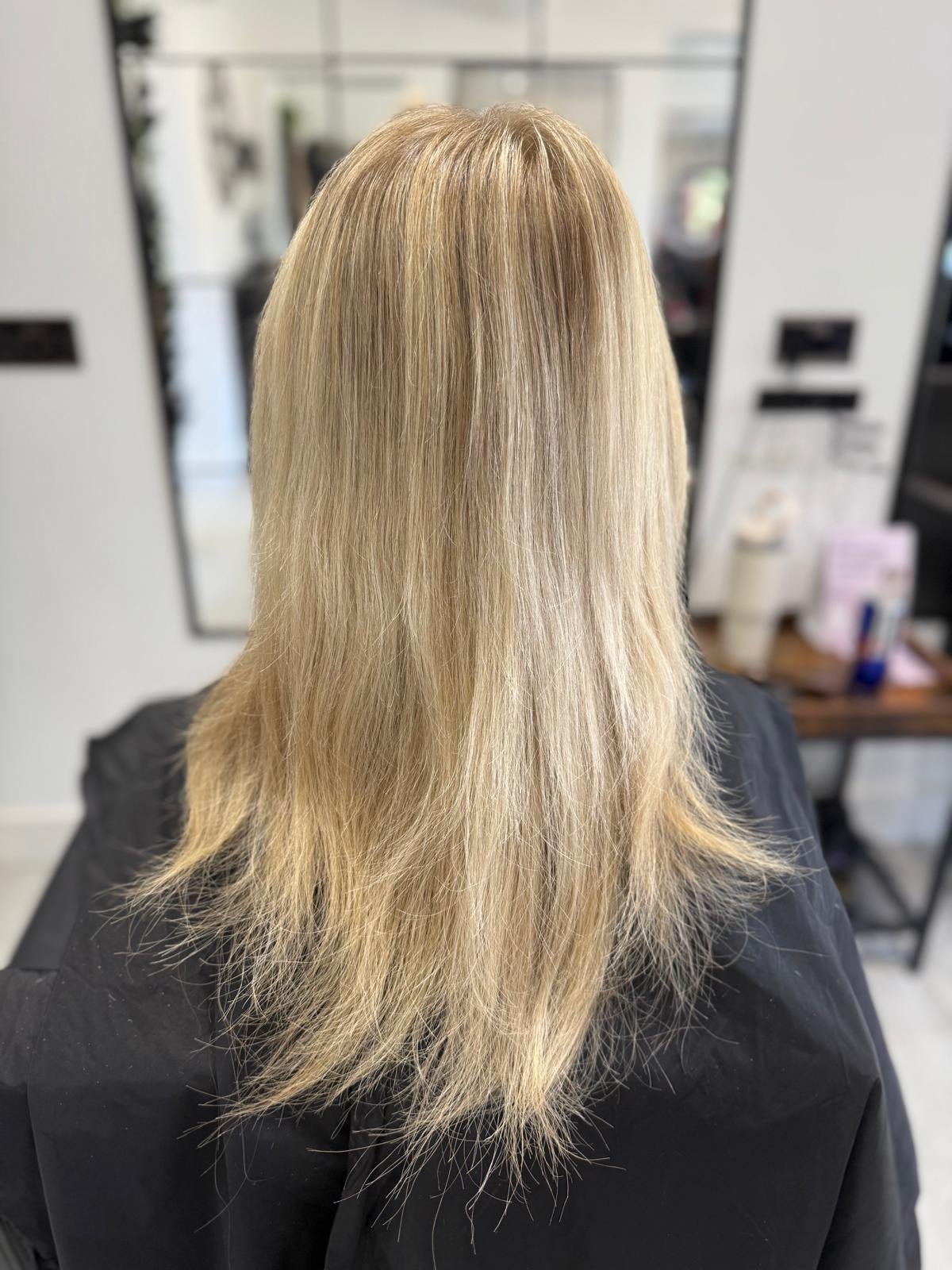 Before photo of straight blonde hair before a Rebecca Jane Hair appointment
